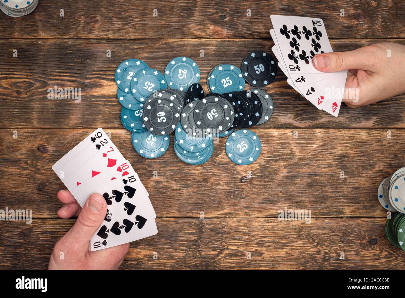 Two players are playing in poker flat lay abstract background Stock Photo -  Alamy