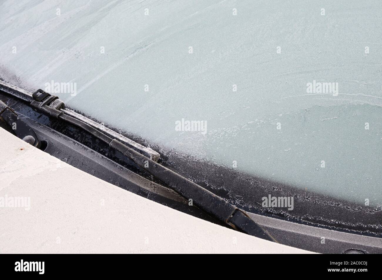 frozen car windshield and wipers in winter Stock Photo Alamy