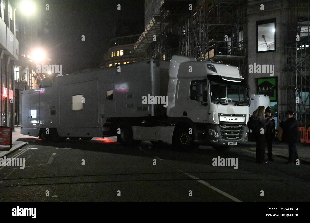 A police mobile unit on Cannon Street near the scene of an incident on London Bridge in central London after a terrorist wearing a fake suicide vest who went on a knife rampage was shot dead by police. Stock Photo