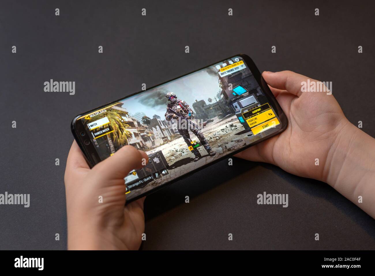 Sarajevo, Bosnia and Herzegovina - November 29, 2019: Kid play Call of Duty: Mobile on Samsung Galaxy S9 plus smartphone close-up Stock Photo