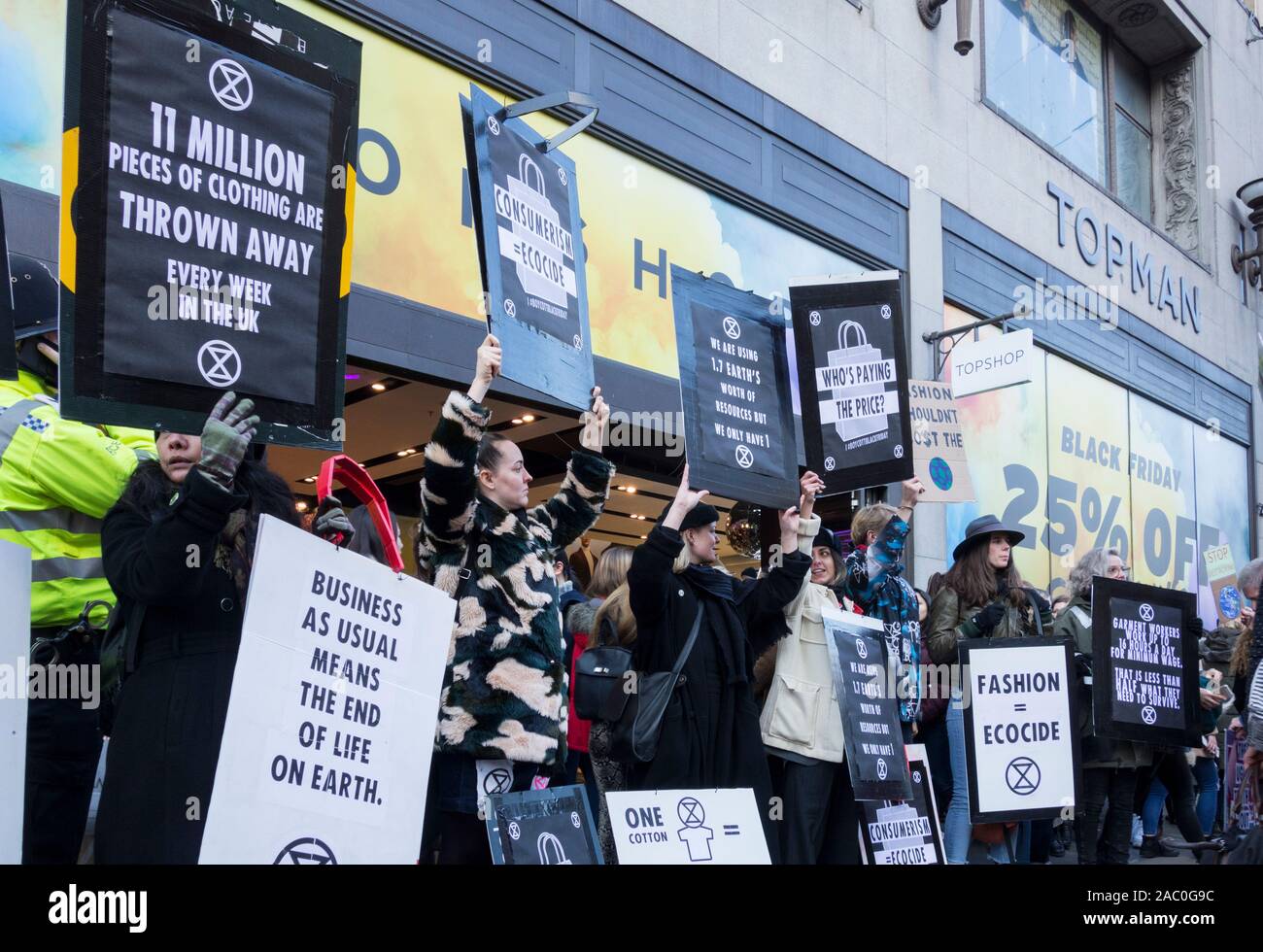 London, England, UK. 29 November 2019.  Extinction Rebellion protest outside Top Shop on Oxford Street, London © Benjamin John/ Alamy Live News. Stock Photo