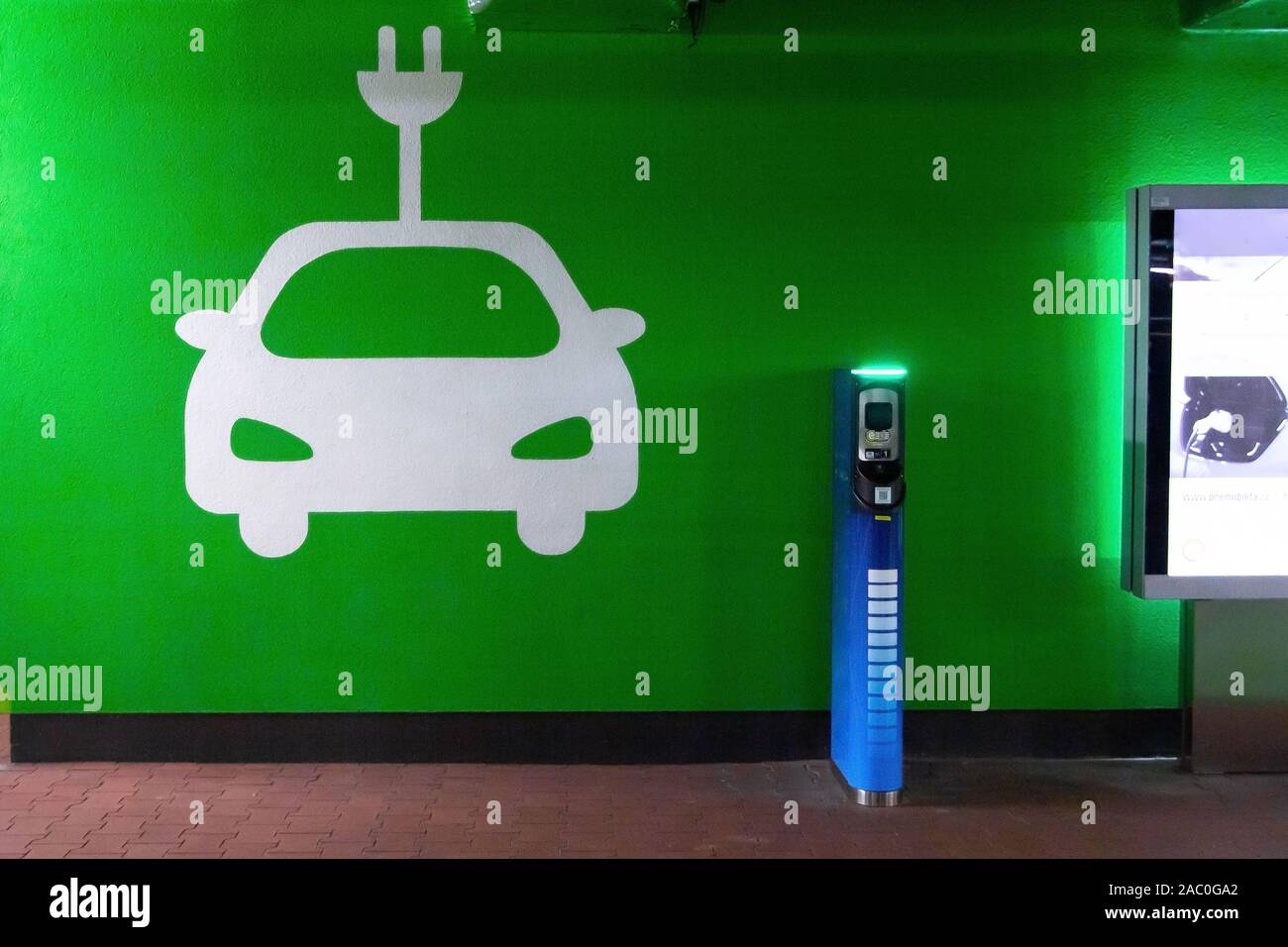 Symbol sign of electric cars charging station. Plug-in charger or socket for PHEV cars or vehicles. Concept of green electricity, clean environment Stock Photo