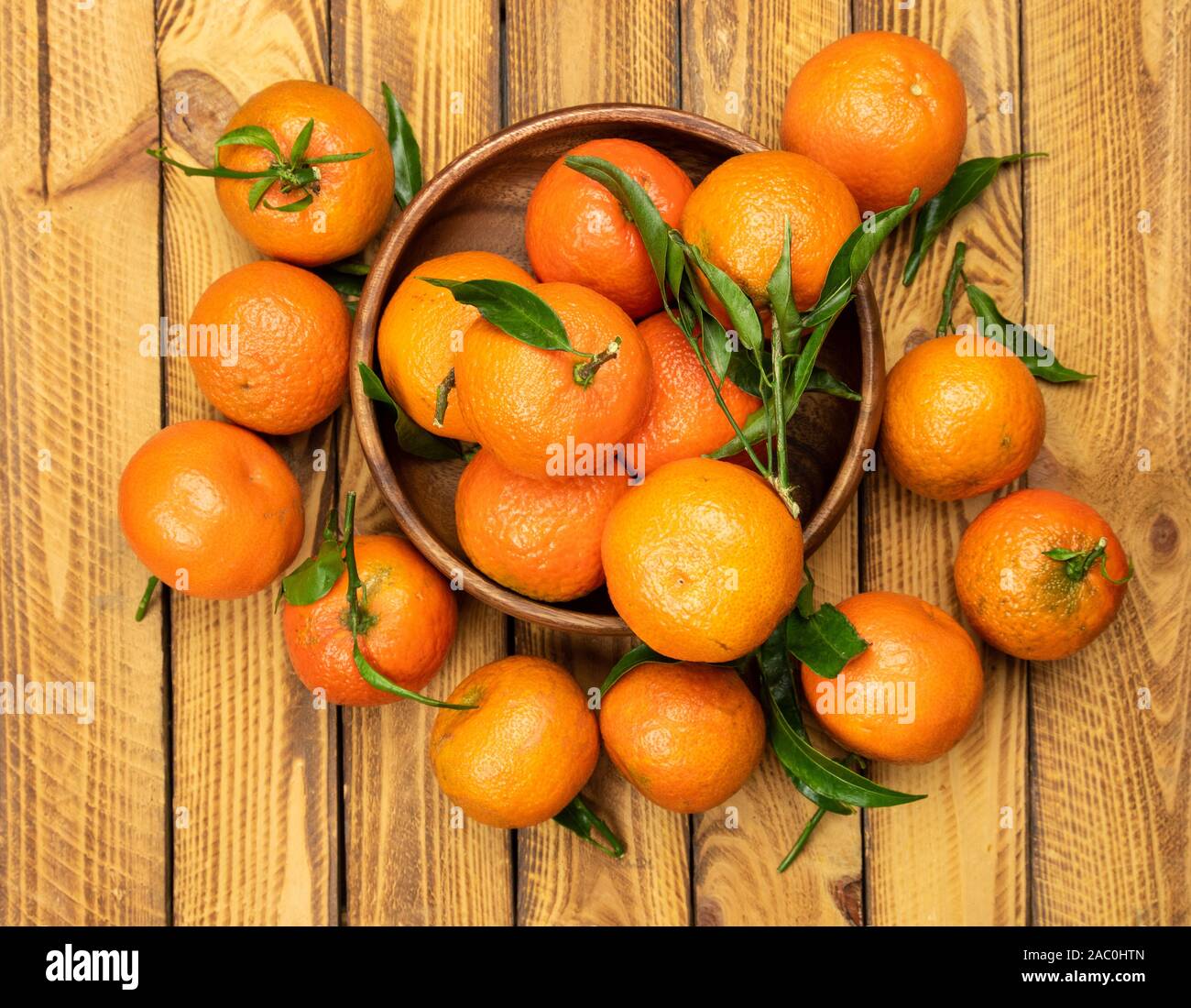 tangerine fruits over old wooden background, top view, overhead Stock Photo