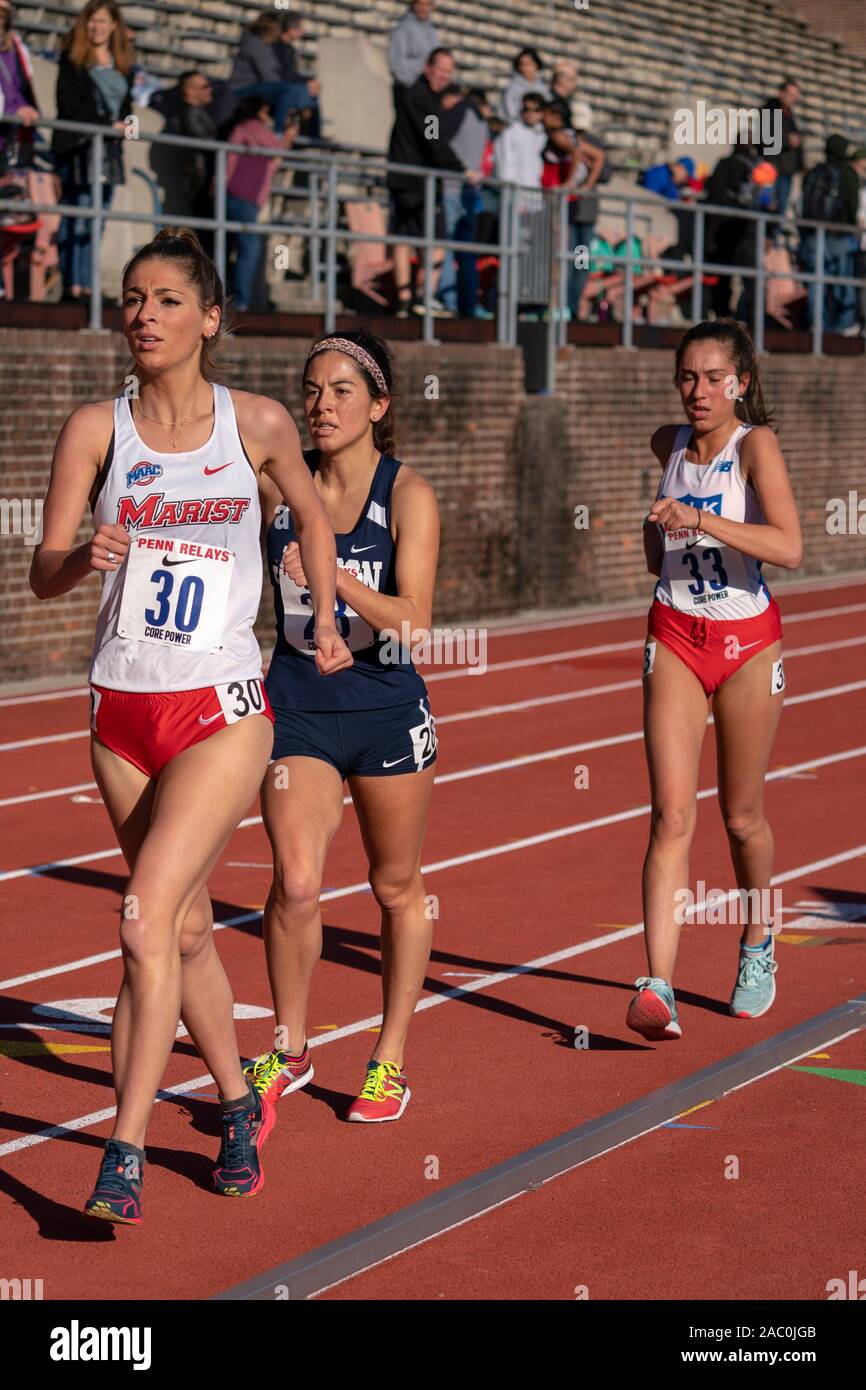 Lauren Harris #30, Anali Cisneros #28, and Kayla Shapiro #33 competing in the Olympic Development Women's 5K Racewalk at the 2019 Penn Relay Stock Photo