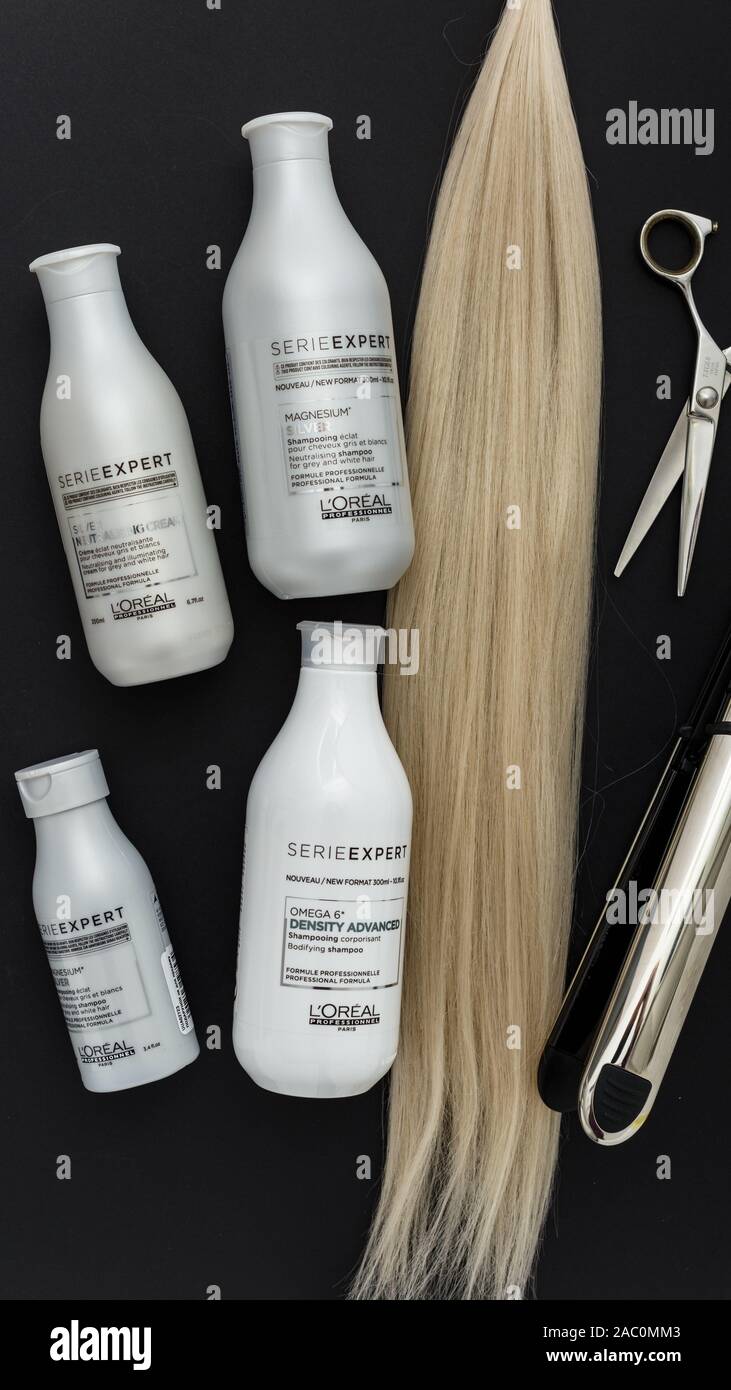 L'oreal professionnel Paris Serie Expert Vitamino Color hair professional  products set.Loreal hair shampoo mask.strand of blonde hair on pink Stock  Photo - Alamy