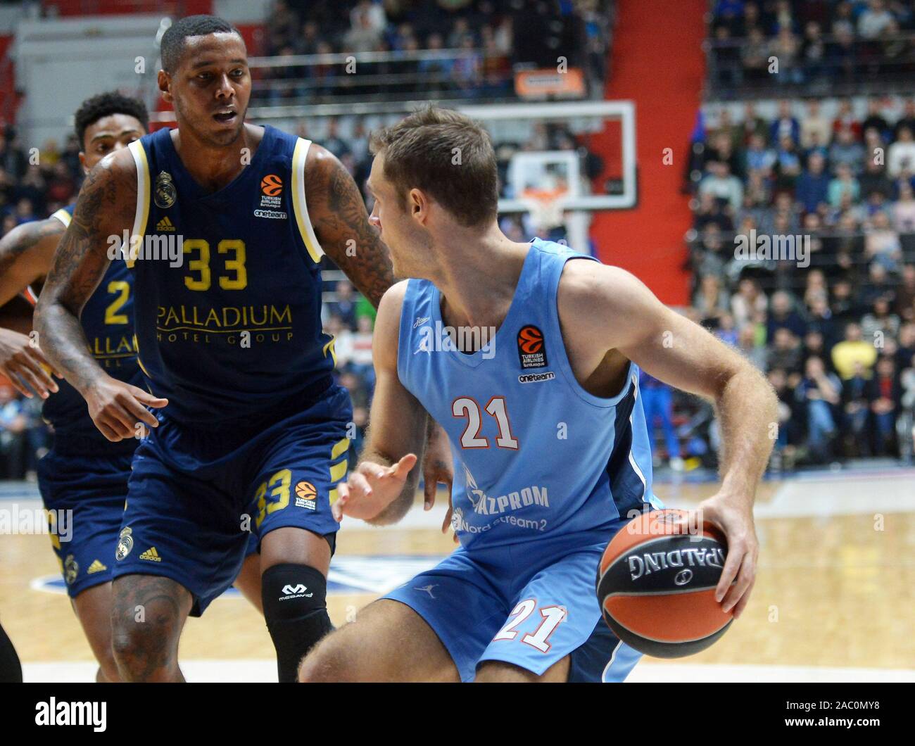 St. Petersburg, Russia. 29th Nov, 2019. Russia. St. Petersburg. November  29, 2019. Players of BC Real Madrid Trey Tompkins and BC Zenit Tim  Abromaitis (left to right) in the Euroleague basketball game