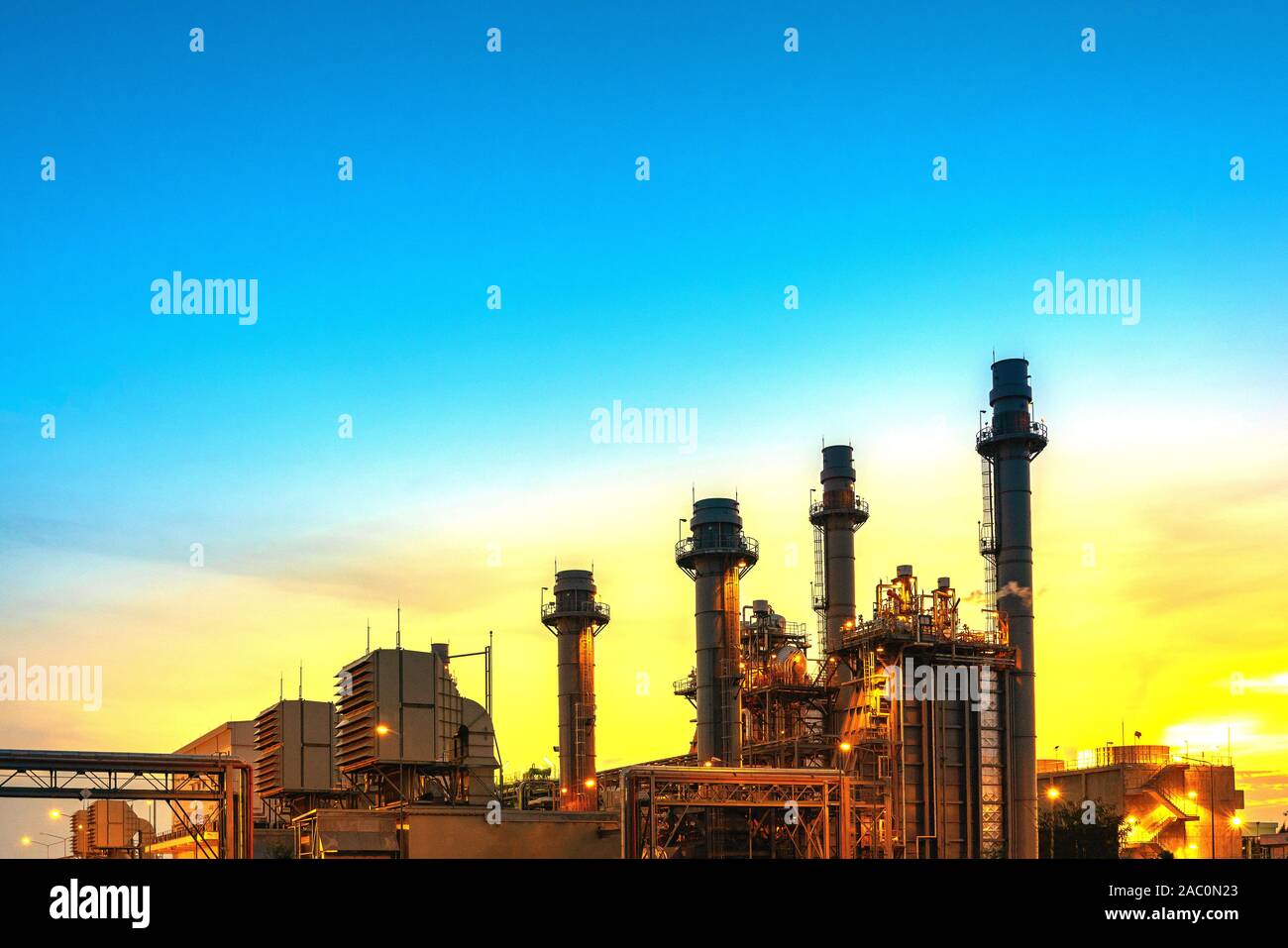 Power plant zone generating electricity at sunset images Stock Photo