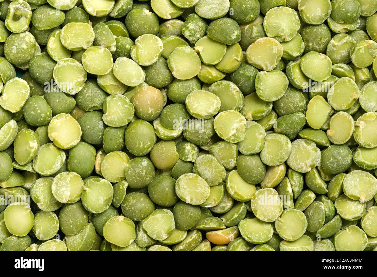 Full-screen macro of green split peas Stock Photo
