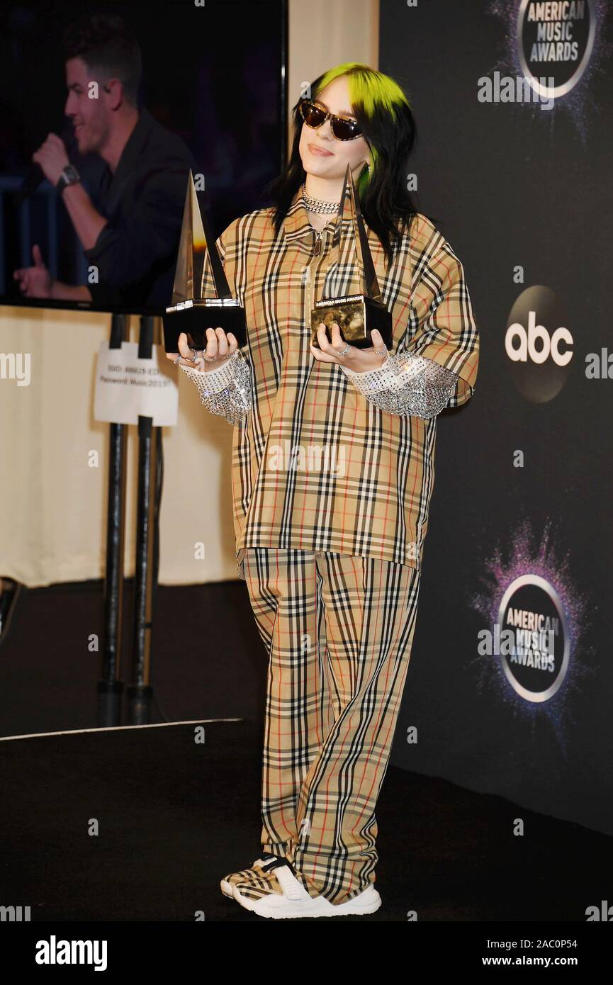 LOS ANGELES, CALIFORNIA - NOVEMBER 24: Billie Eilish, winner of New Artist of the Year and Favorite Artist - Alternative Rock, poses in the press room during the 2019 American Music Awards at Microsoft Theater on November 24, 2019 in Los Angeles, California. Stock Photo