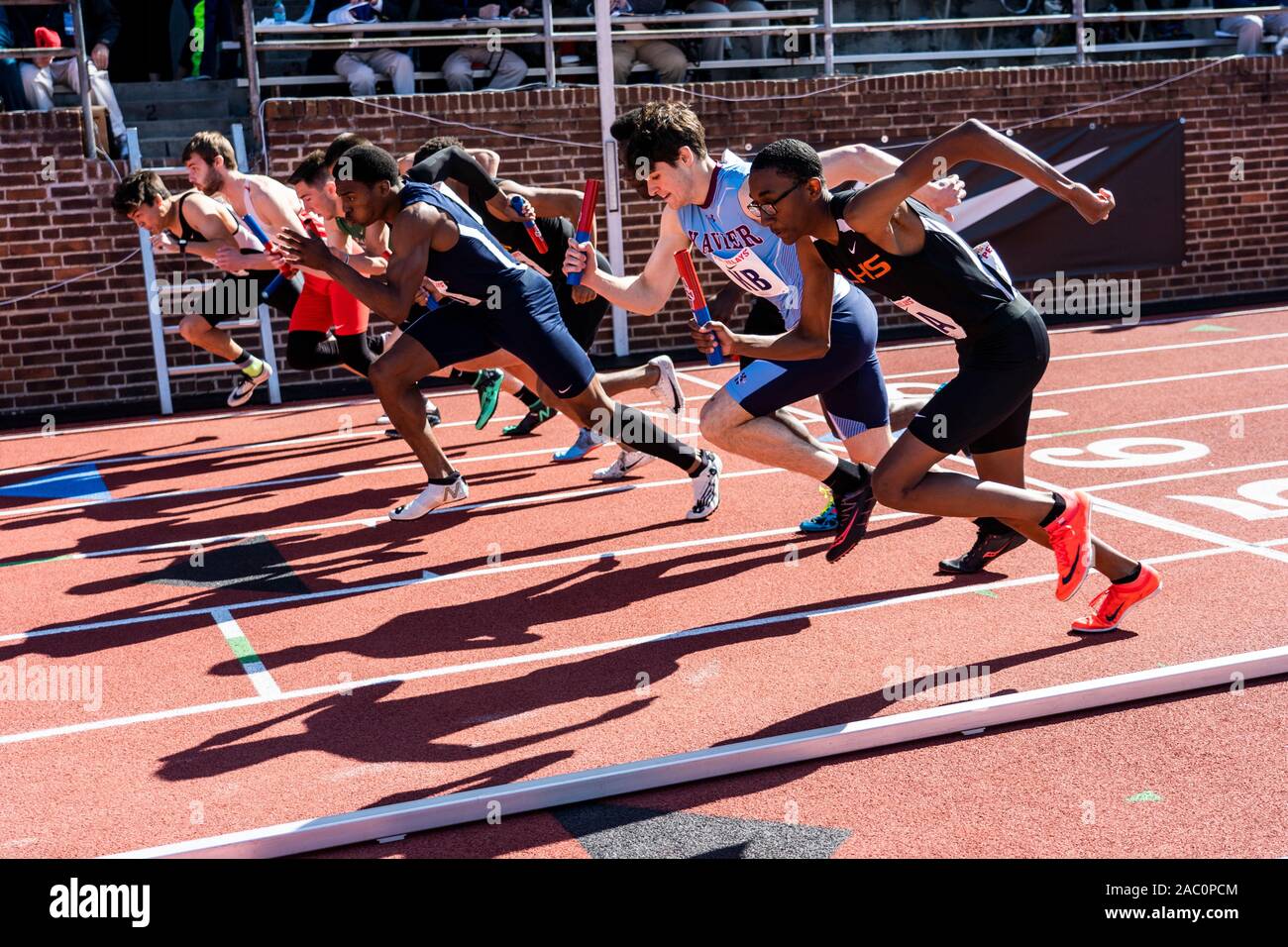 High School boys 4x400 runners competing at the 2019 Penn Relay Stock