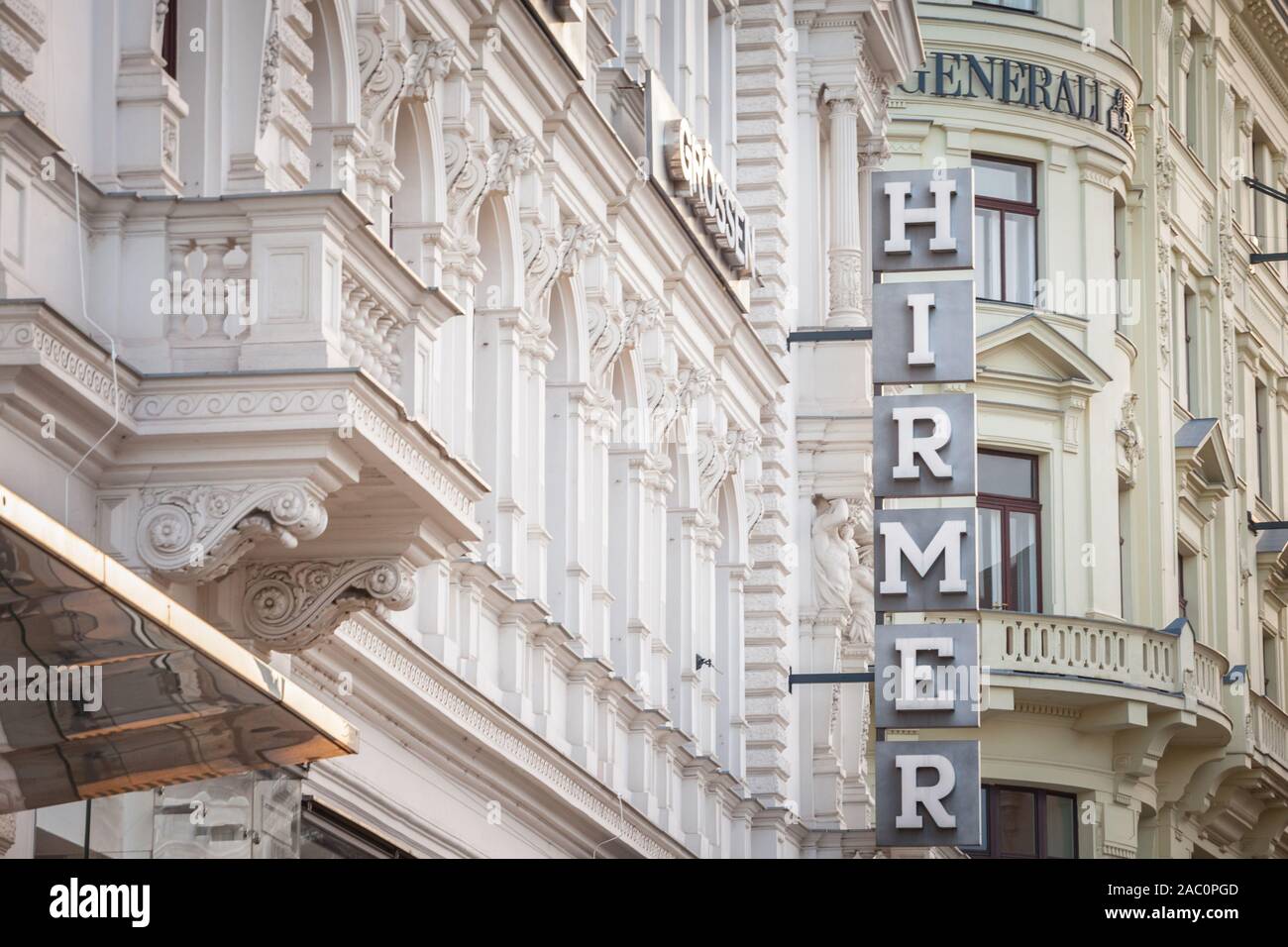 VIENNA, AUSTRIA - NOVEMBER 6, 2019: Hirmer department store logo in front of their boutique for Vienna. It is a German Bavarian chain of department st Stock Photo