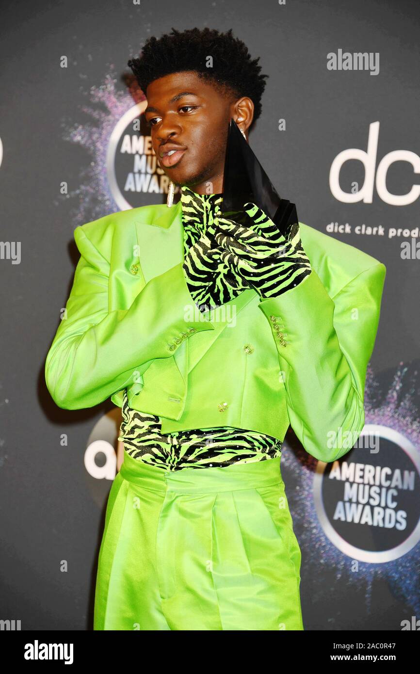 LOS ANGELES, CALIFORNIA - NOVEMBER 24: Lil Nas X, winner of the Favorite Song - Rap/Hip-Hop for “Old Town Road” ft. Billy Ray Cyrus poses in the press room during the 2019 American Music Awards at Microsoft Theater on November 24, 2019 in Los Angeles, California. Stock Photo
