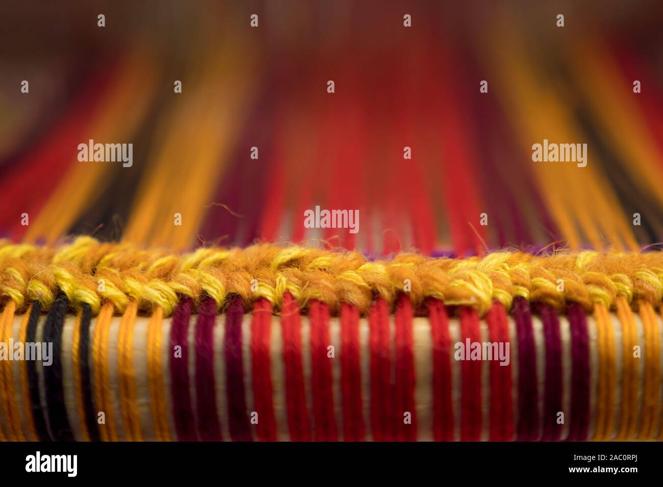 Manual wood loom. Hand loom background. Detail of traditional vintage