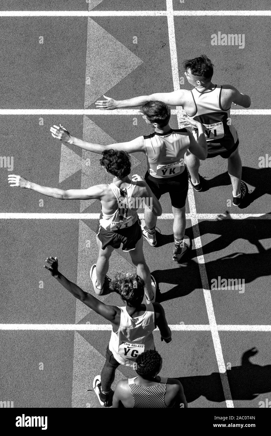 High School boys 4x400 runners competing at the 2019 Penn Relay . Stock Photo