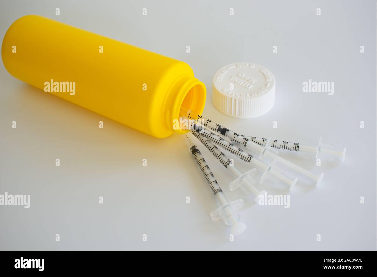Sharps container for used needles Stock Photo Alamy