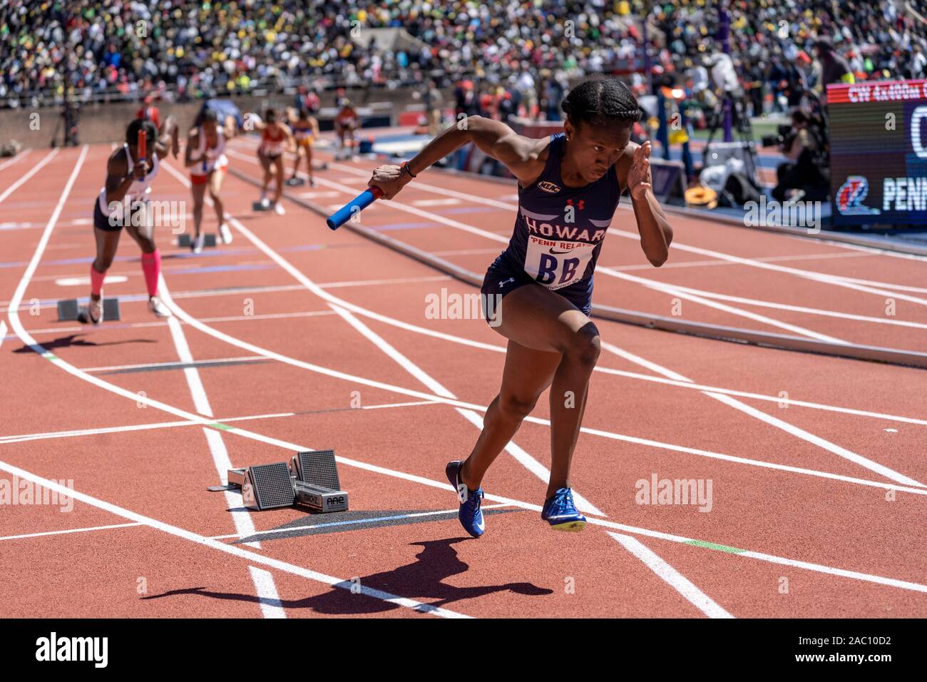 Start of College Women's 4x400  at the 2019 Penn Relay . Stock Photo