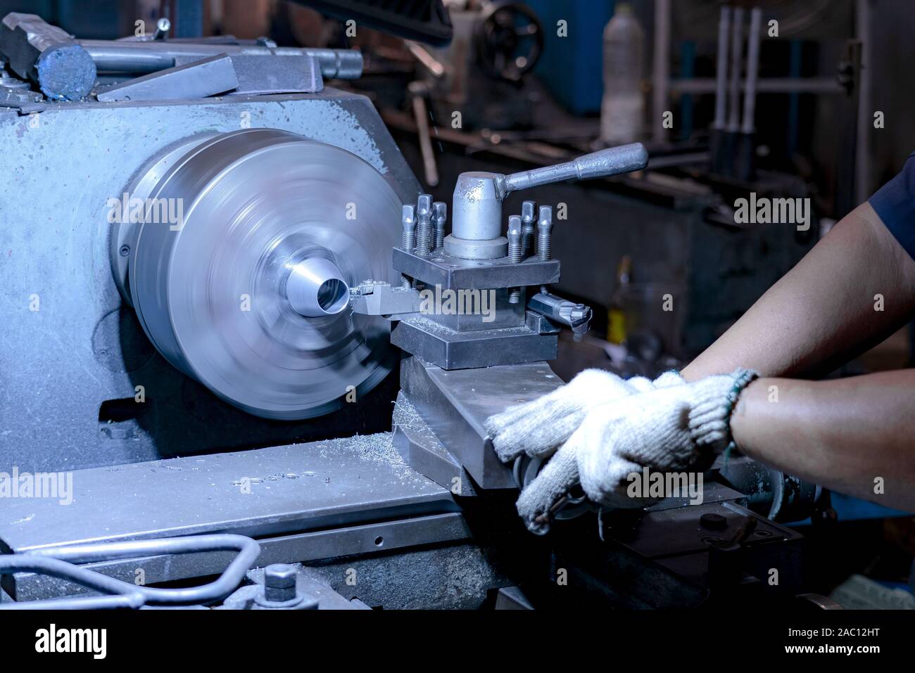 Professional workers are doing the milling process for metal parts
