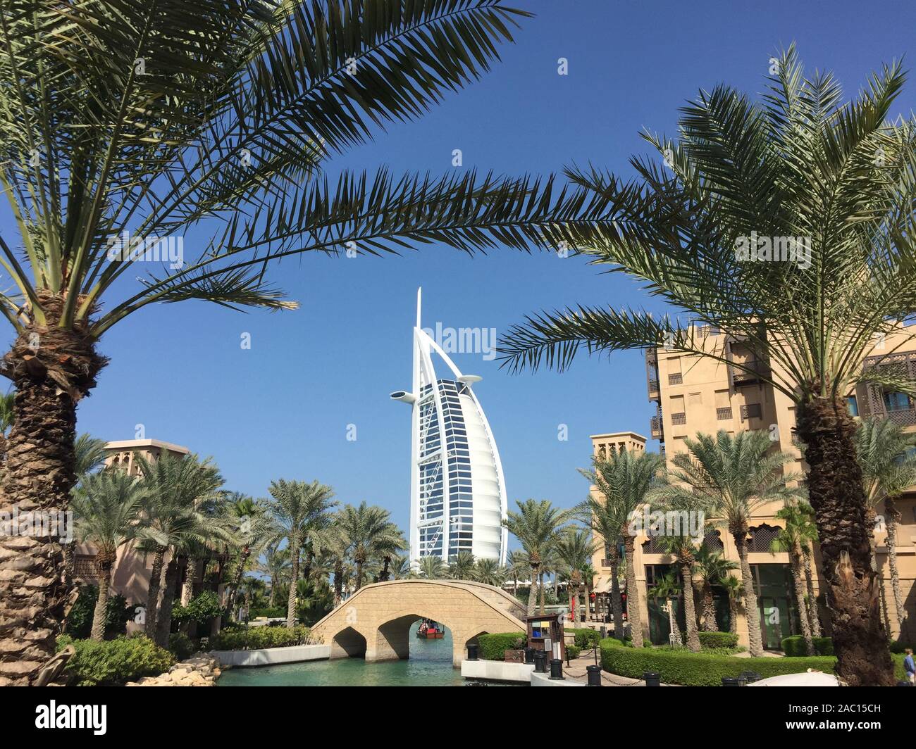 Dubai, UAE - Dec 9, 2018. View of Burj Al Arab hotel from Madinat Jumeirah. Madinat is a luxury resort which includes hotels and souk covering an area Stock Photo