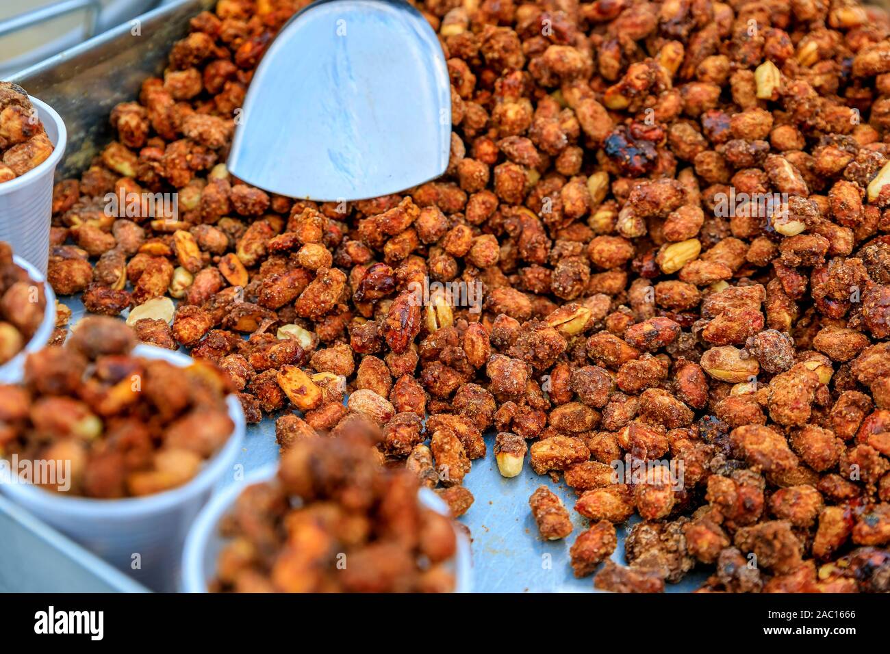 London street food sweet roasted caramelized peanuts in plastic cups