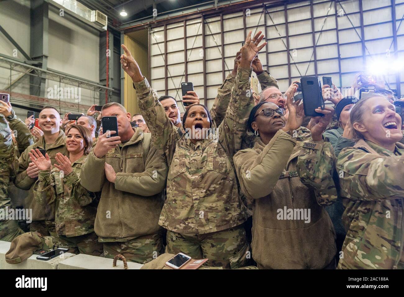 Afghanistan. 28th Nov, 2019. United States service members deployed to Bagram Airfield in Afghanistan applaud as President Donald J. Trump delivers remarks Thursday, Nov. 28, 2019, during a surprise Thanksgiving visit People: President Donald Trump Credit: Storms Media Group/Alamy Live News Stock Photo
