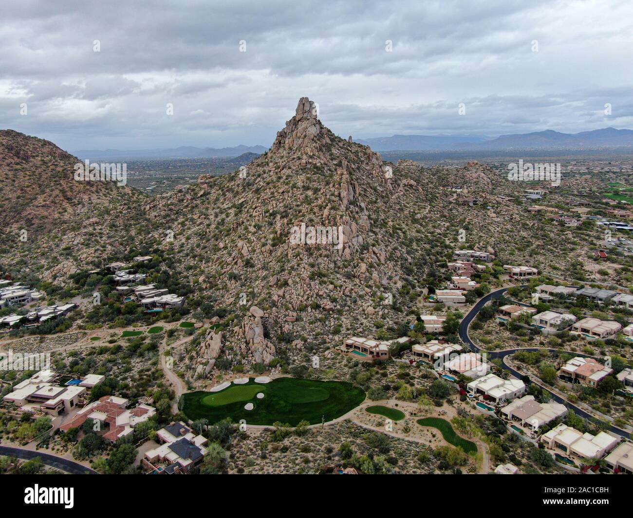 Curated visual reference: Visual Reference: Aerial View Above Golf Course And Upscale Luxury Homes In