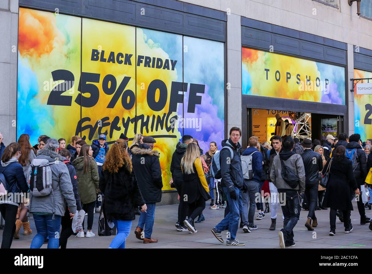 Bargain hunters take advantage of a huge saving as departmental stores on  Oxford Street cut down their prices during the Black Friday event.Black  Friday is a shopping event where retailers cut prices