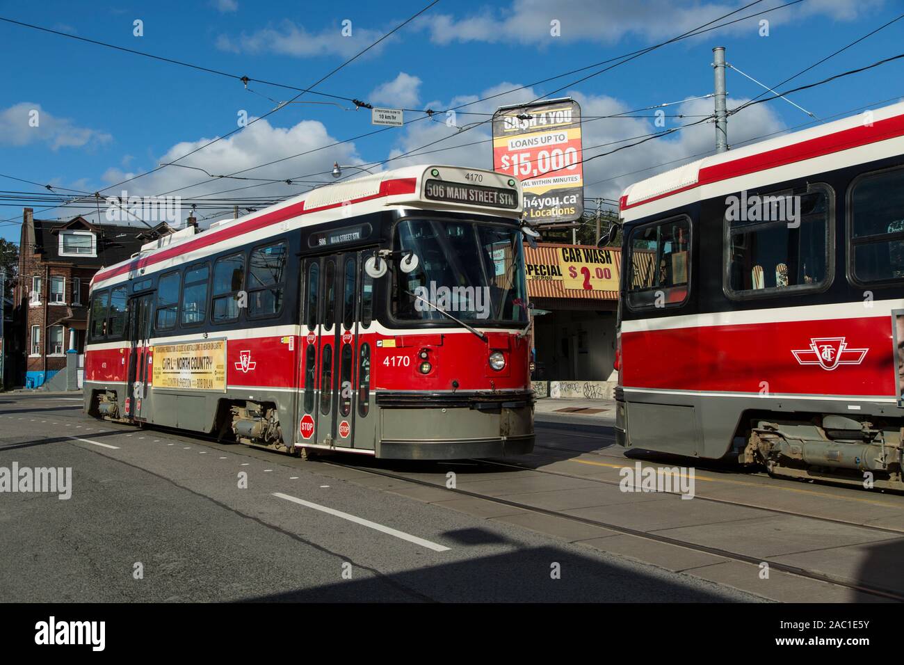 toronto ttc streetcar on city street transit in urban environment sunny sky autumn weather Stock Photo