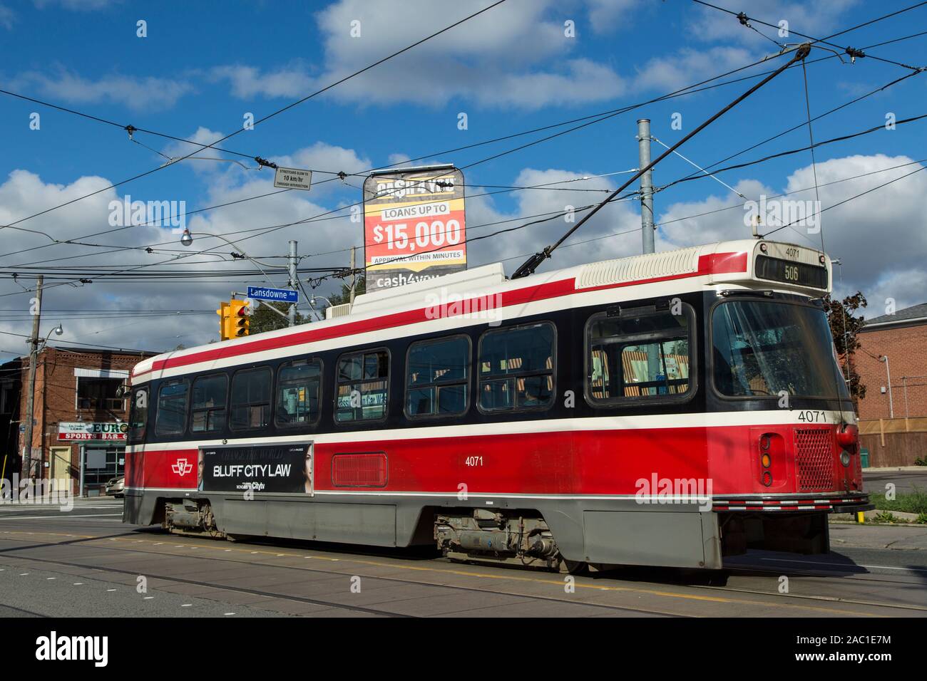 toronto ttc streetcar on city street transit in urban environment sunny sky autumn weather Stock Photo