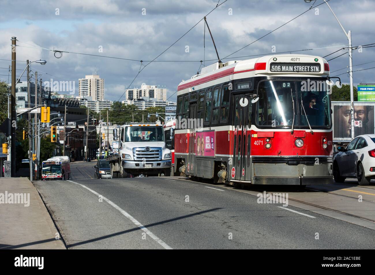toronto ttc streetcar on city street transit in urban environment sunny sky autumn weather Stock Photo