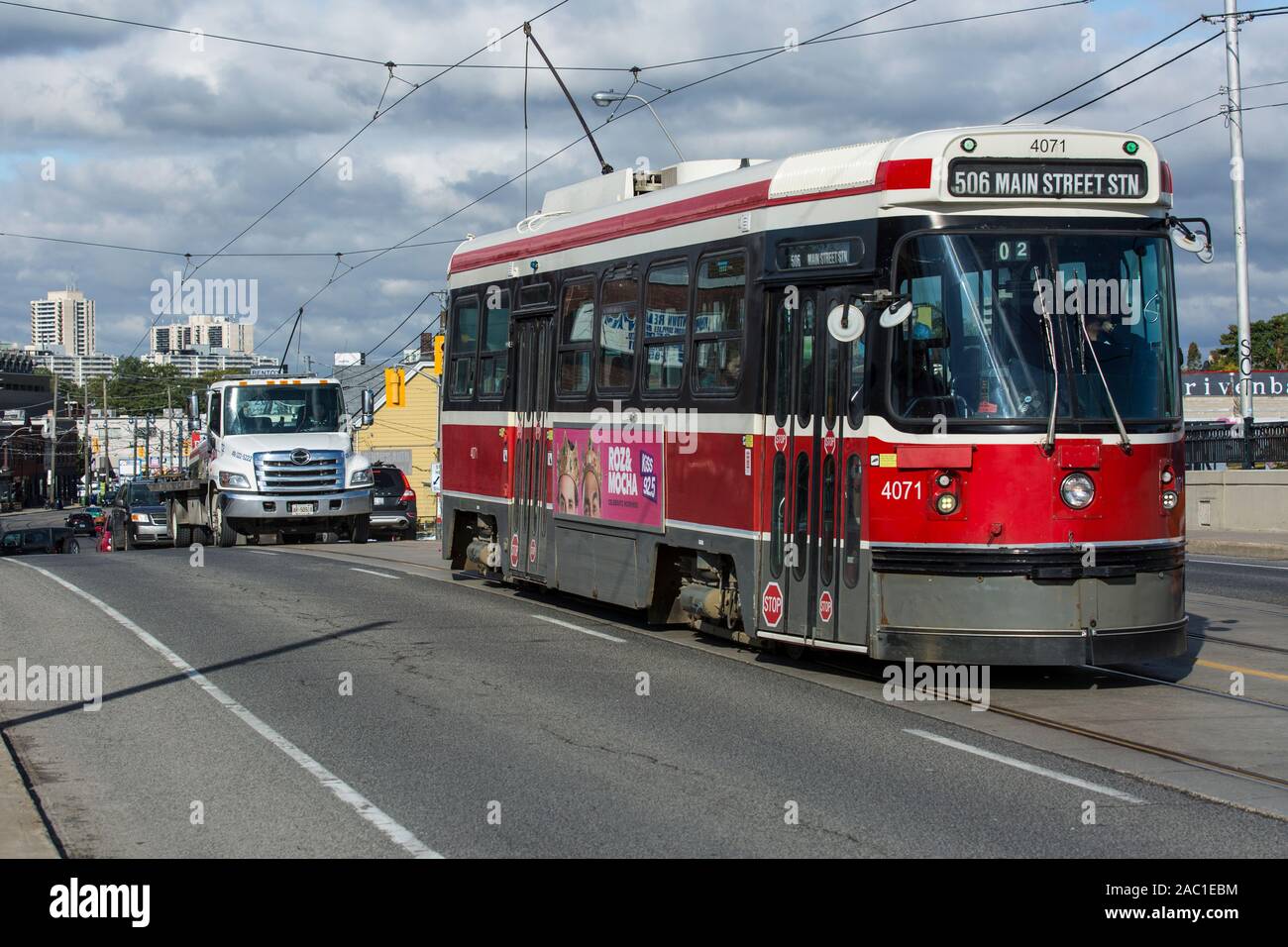 toronto ttc streetcar on city street transit in urban environment sunny sky autumn weather Stock Photo