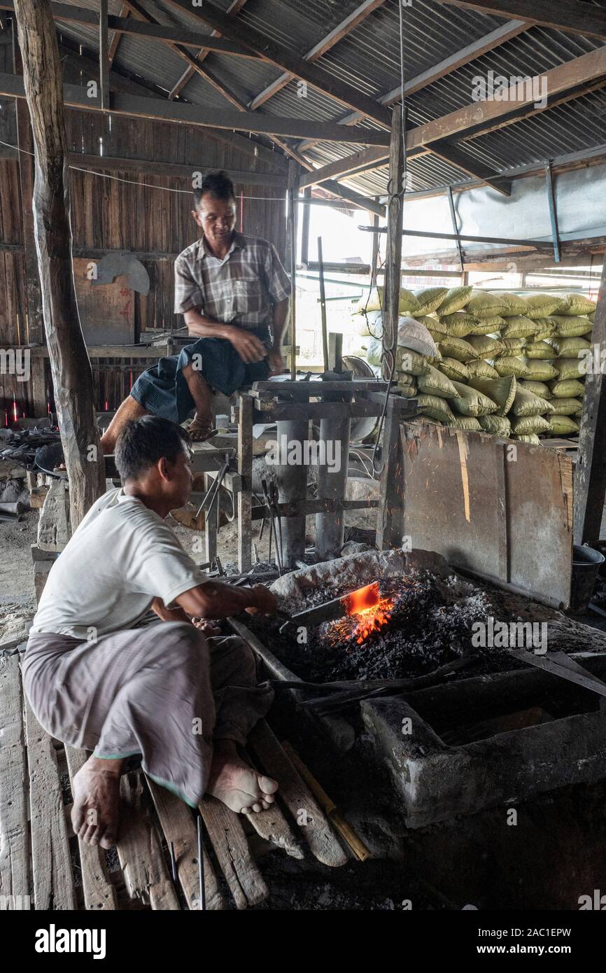 Traditional blacksmith workers on Inle Lake in Myanmar, Asia Stock