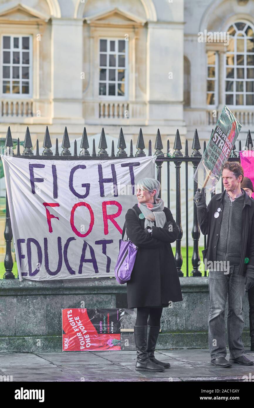 Striking lecturers at Cambridge university, England, stand outside Senate House on Friday 29th November 2019 to protest about changes to their pensions. Stock Photo