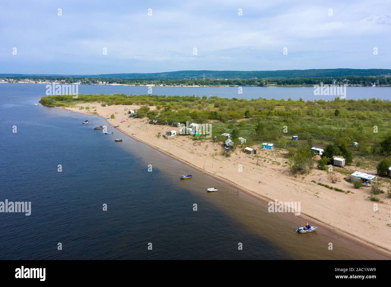 an island on the Volga near Samara. the island is a tent city of tourists and fishermen. People relax in the summer in nature Stock Photo