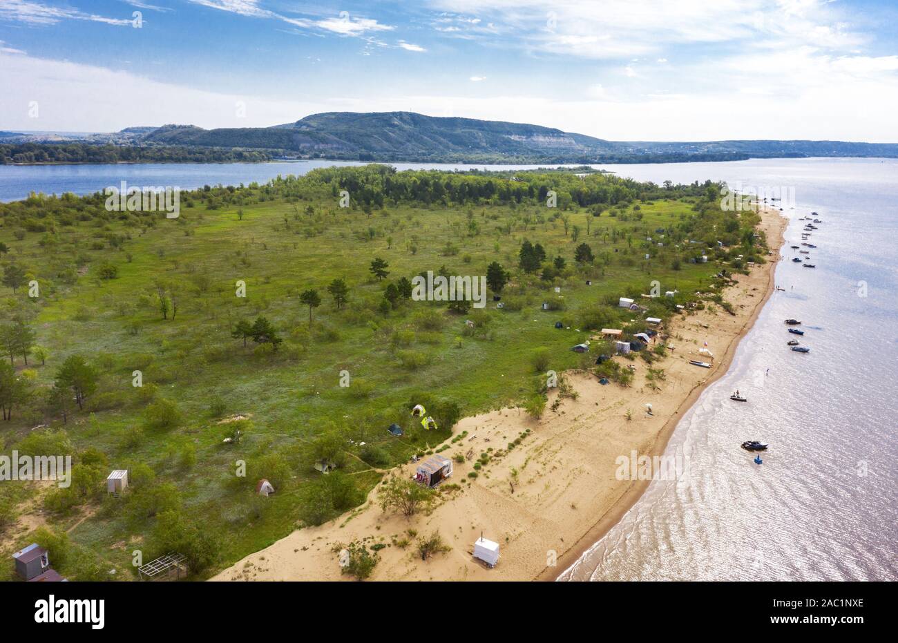 an island on the Volga near Samara. the island is a tent city of tourists and fishermen. People relax in the summer in nature Stock Photo