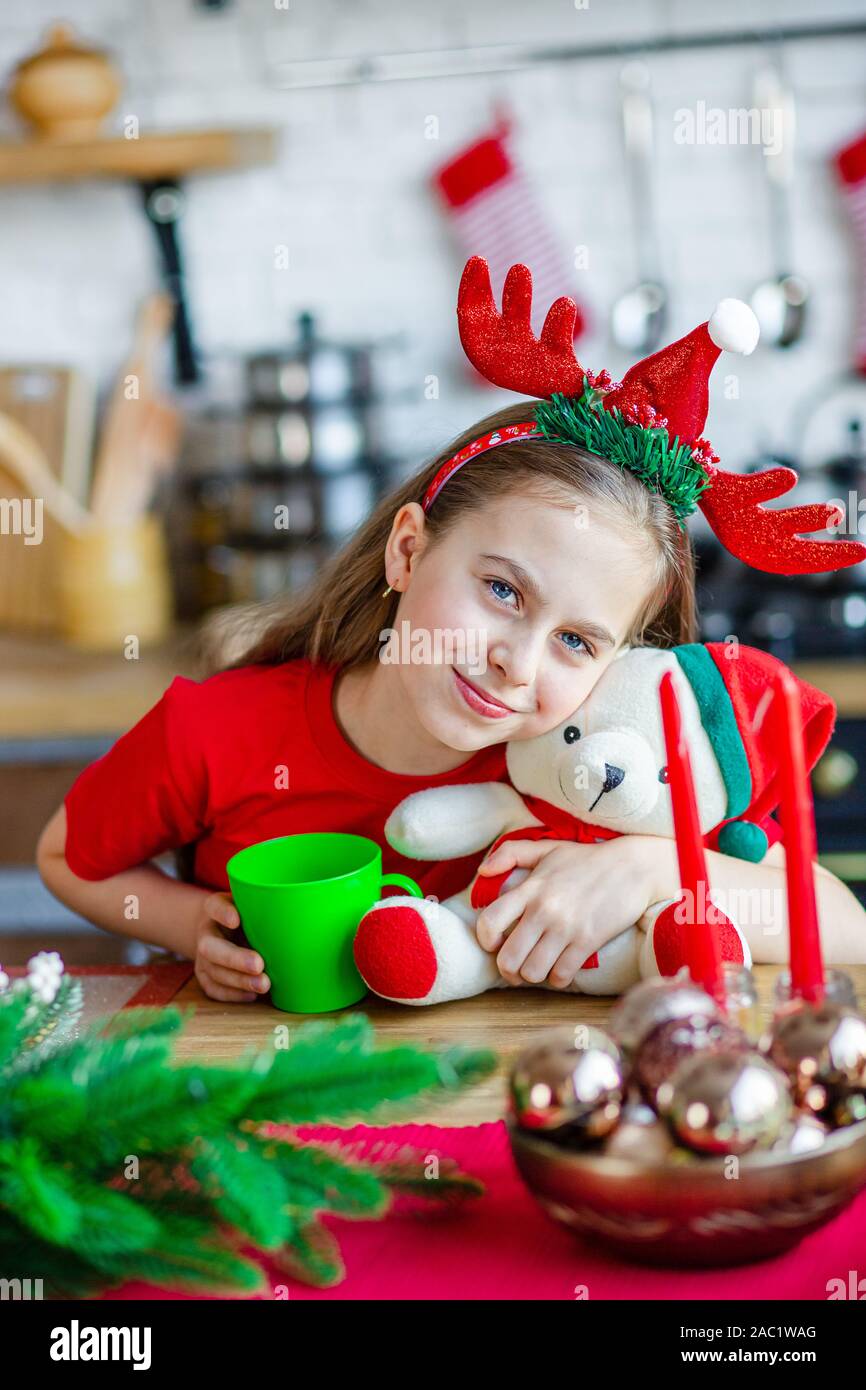 Good Morning A Cute Sleepy Girl Drinks Tea At The Kitchen Table