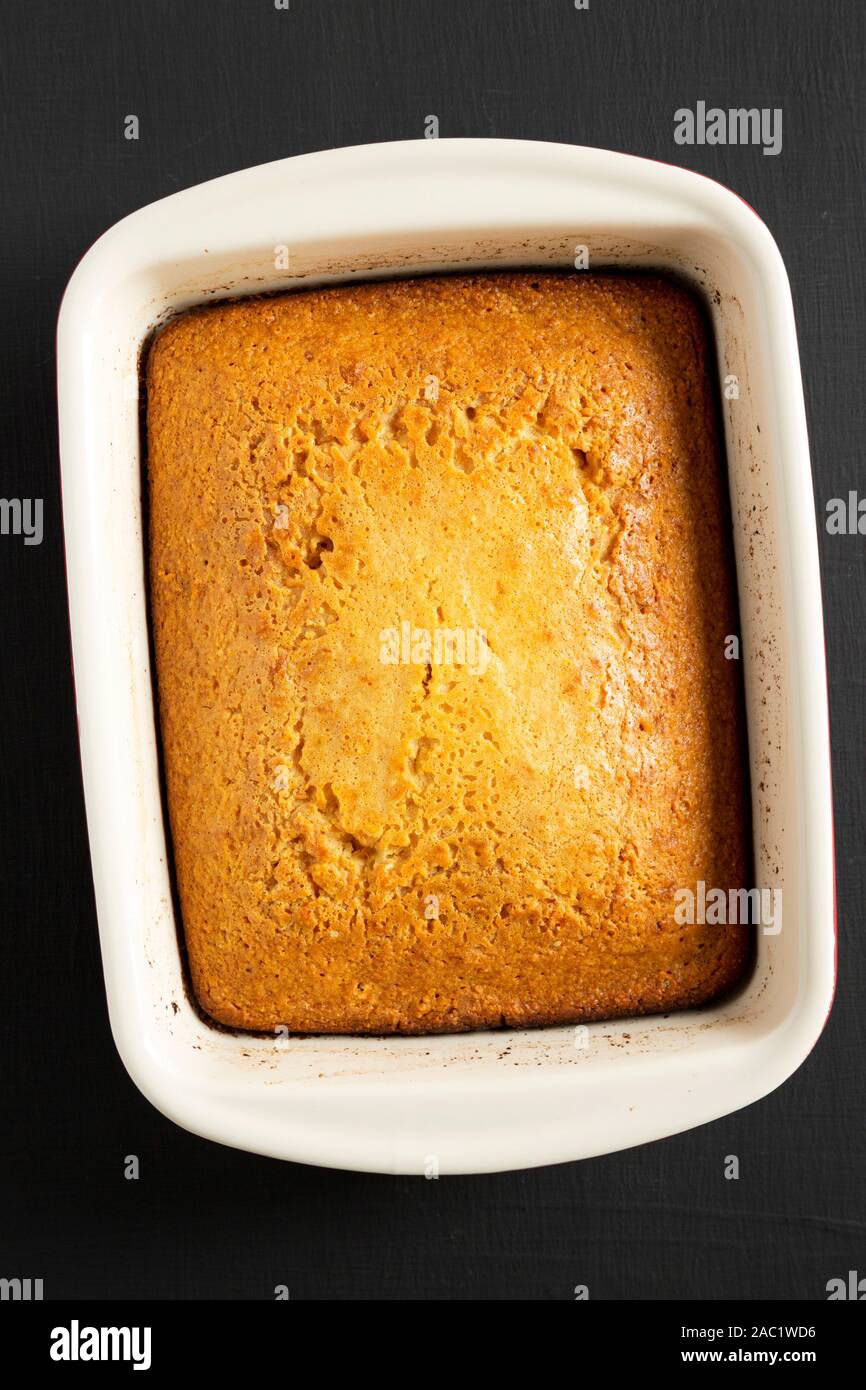 Homemade sweet Cornbread Ready to Eat on a black surface, top view ...