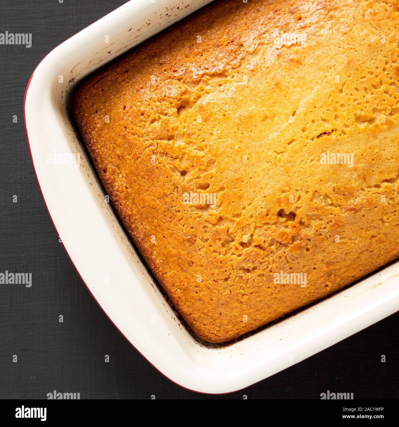 Homemade sweet Cornbread Ready to Eat on a black surface, top view ...