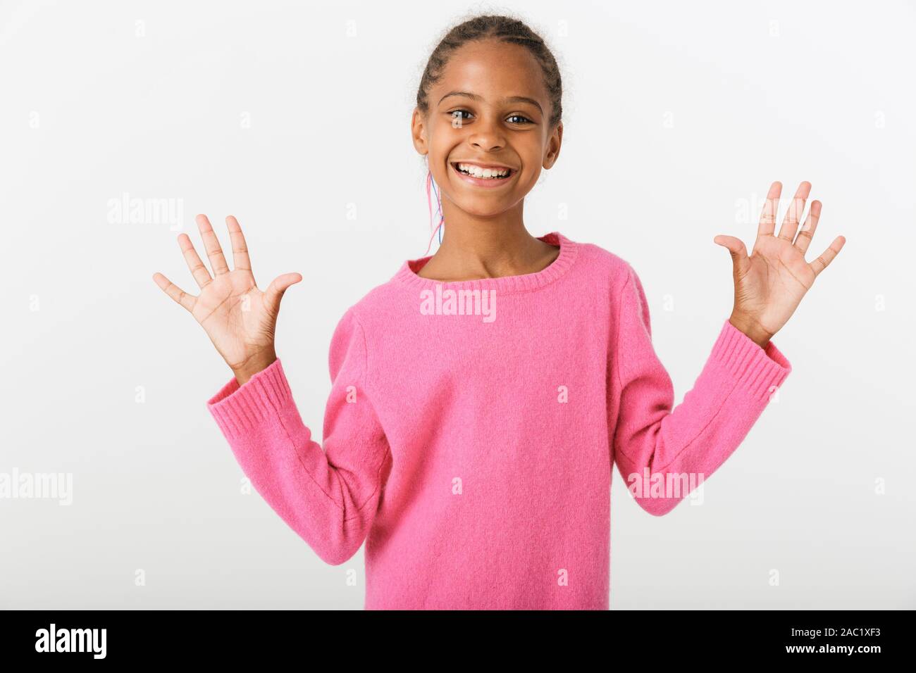 Image of cheerful african american girl smiling and showing her palms ...