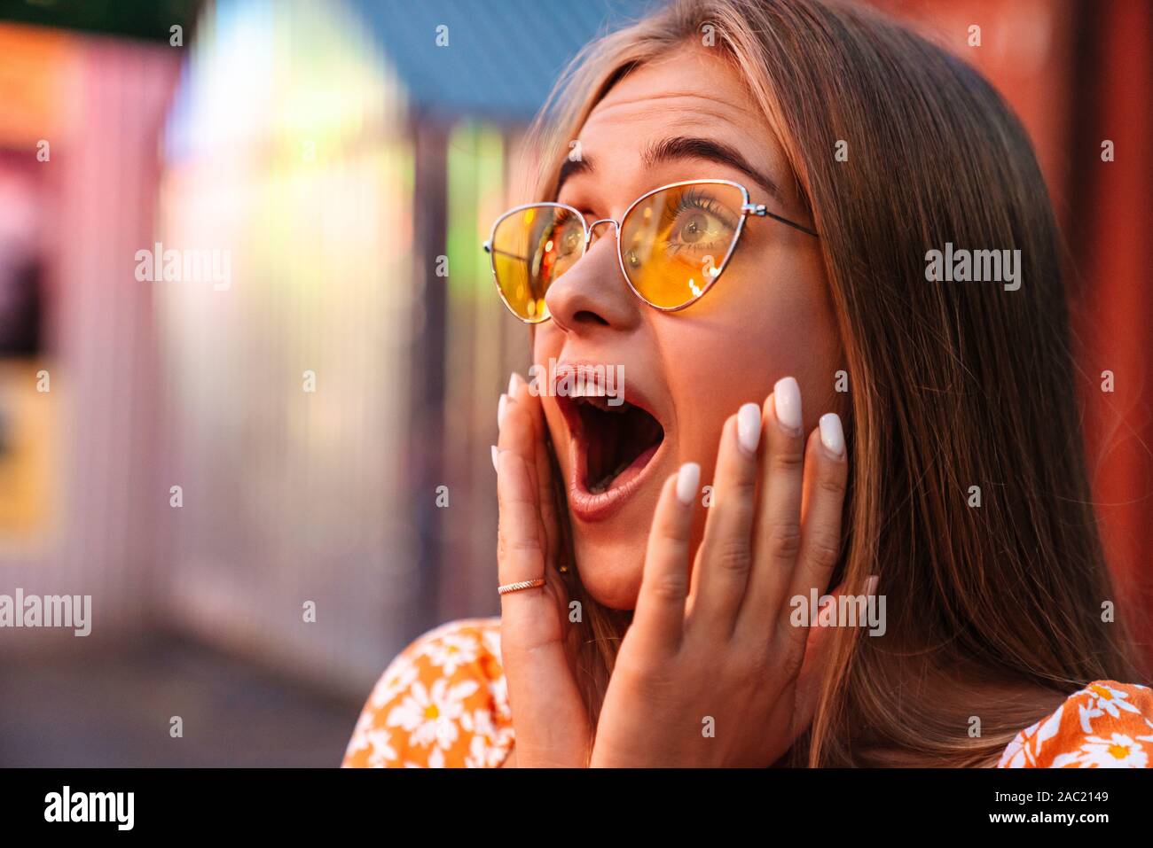 Shocked Walk In Photo of a shocked cute woman walking outdoors in amusement park ...