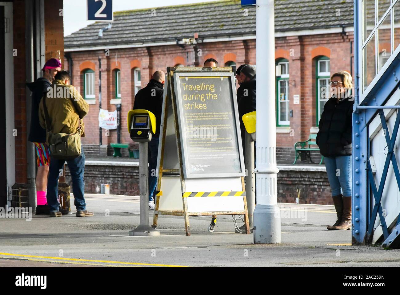 Yeovil Junction, Somerset, UK.  30th November 2019.  View of a notice board on the platform at Yeovil Junction station in Somerset ahead of the planned strike action by the RMT union against South Western Railway which begins on Monday 2nd December and last for 27 days.  Picture Credit: Graham Hunt/Alamy Live News Stock Photo