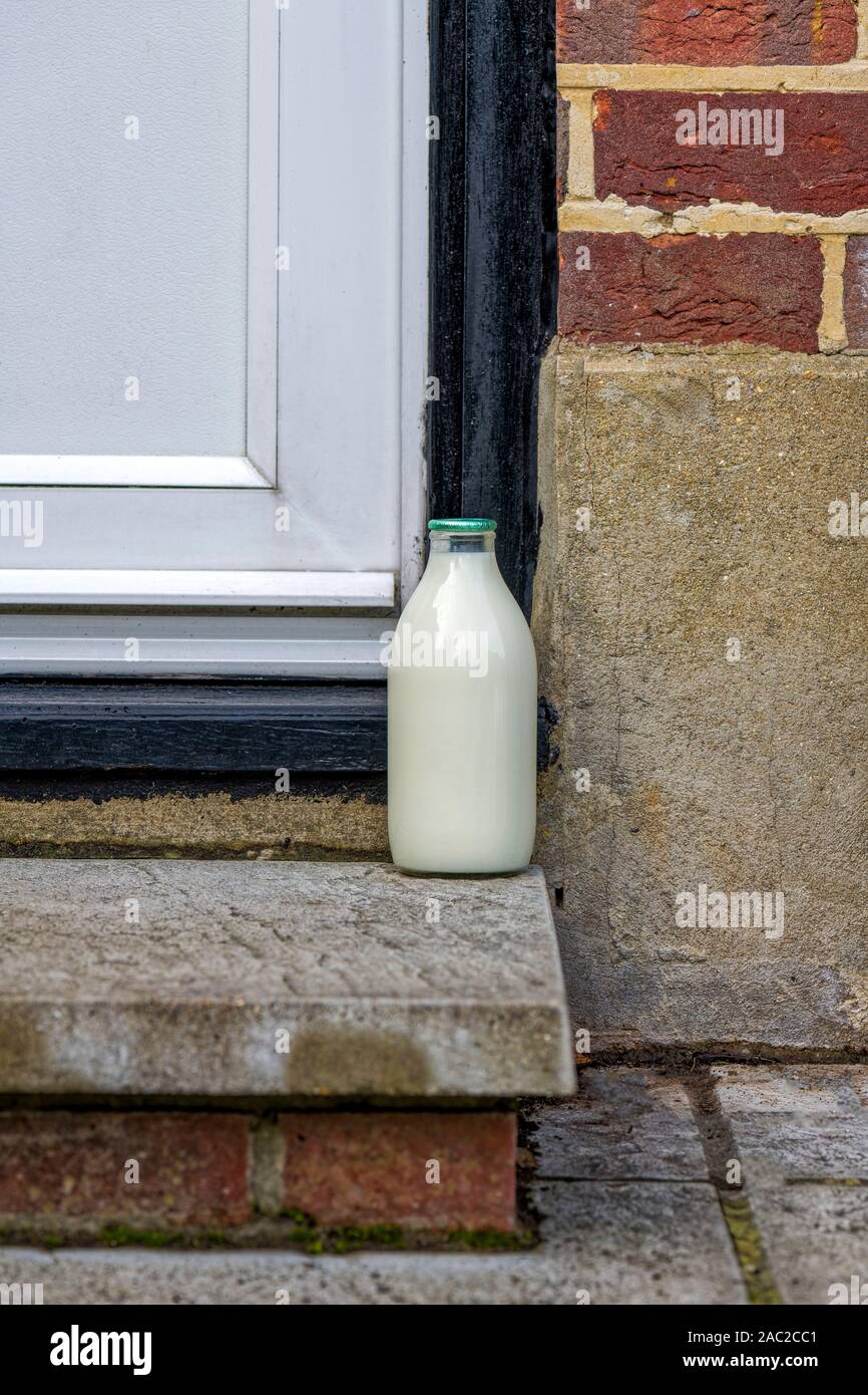 Authentic image of doorstep delivery of milk in recycleable glass