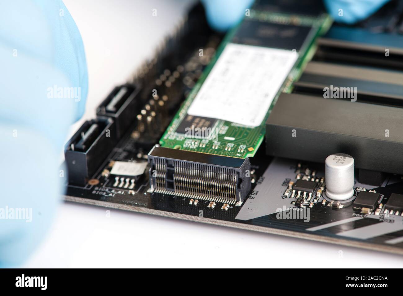 Ssd disk hard drive inside pc motherboard Stock Photo - Alamy