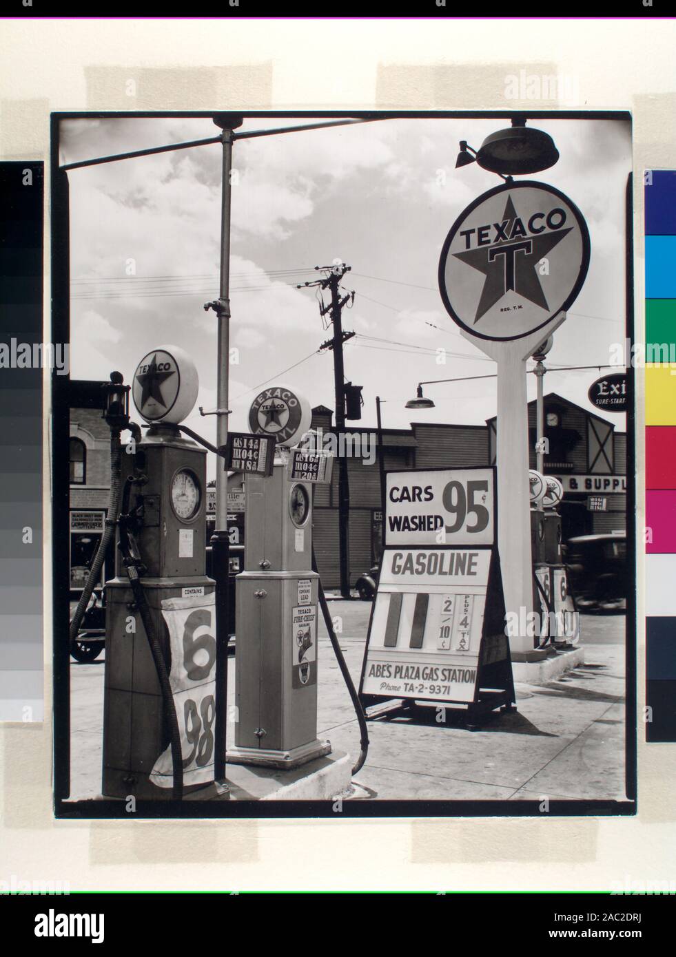 Gasoline station, Tremont Avenue and Dock Street, Bronx Four gas pumps