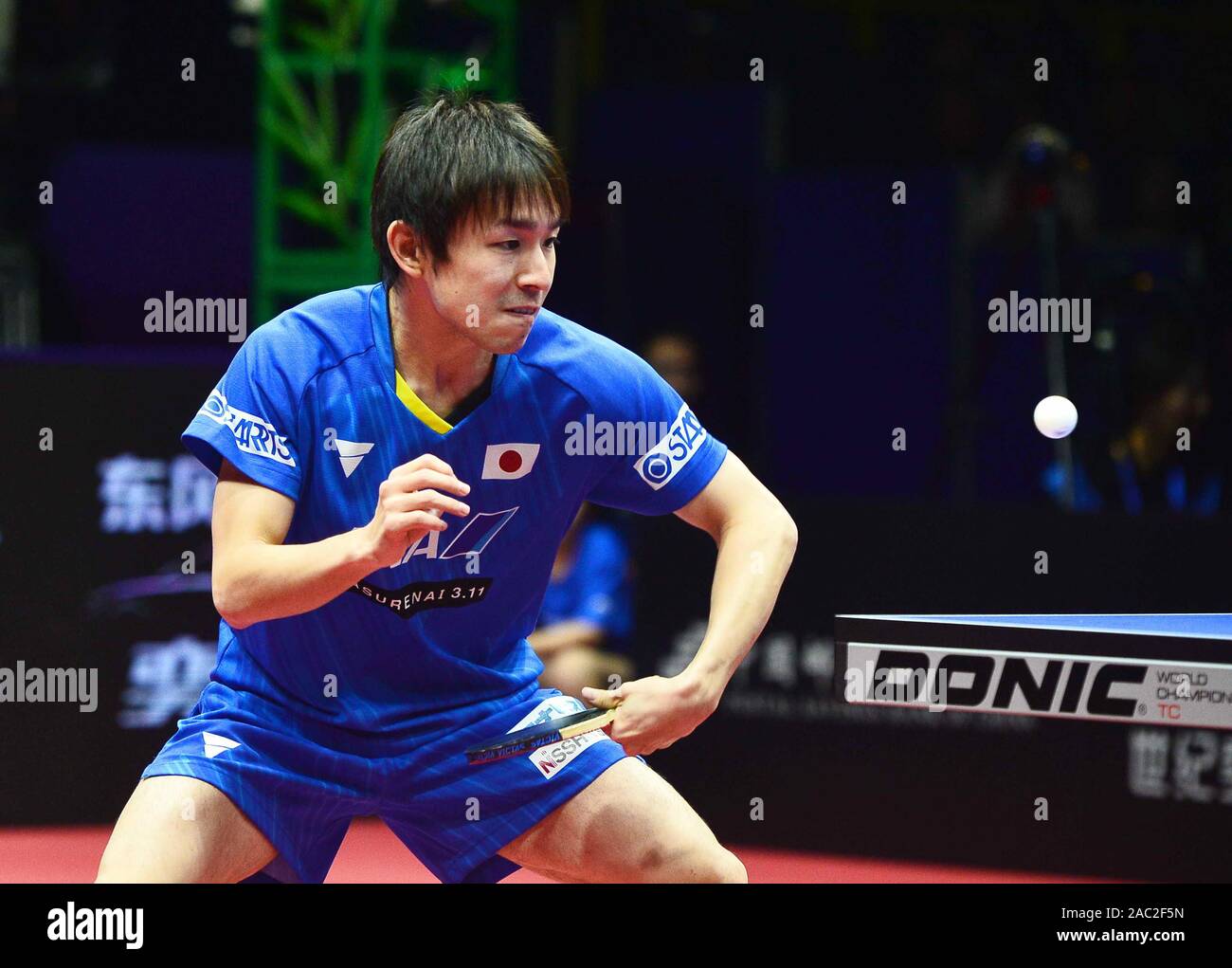 Koki Niwa of Japan in action against Tomokazu Harimoto of Japan in their Men's Singles Quarterfinals match during the 2019 ITTF Men's World Cup in Che Stock Photo