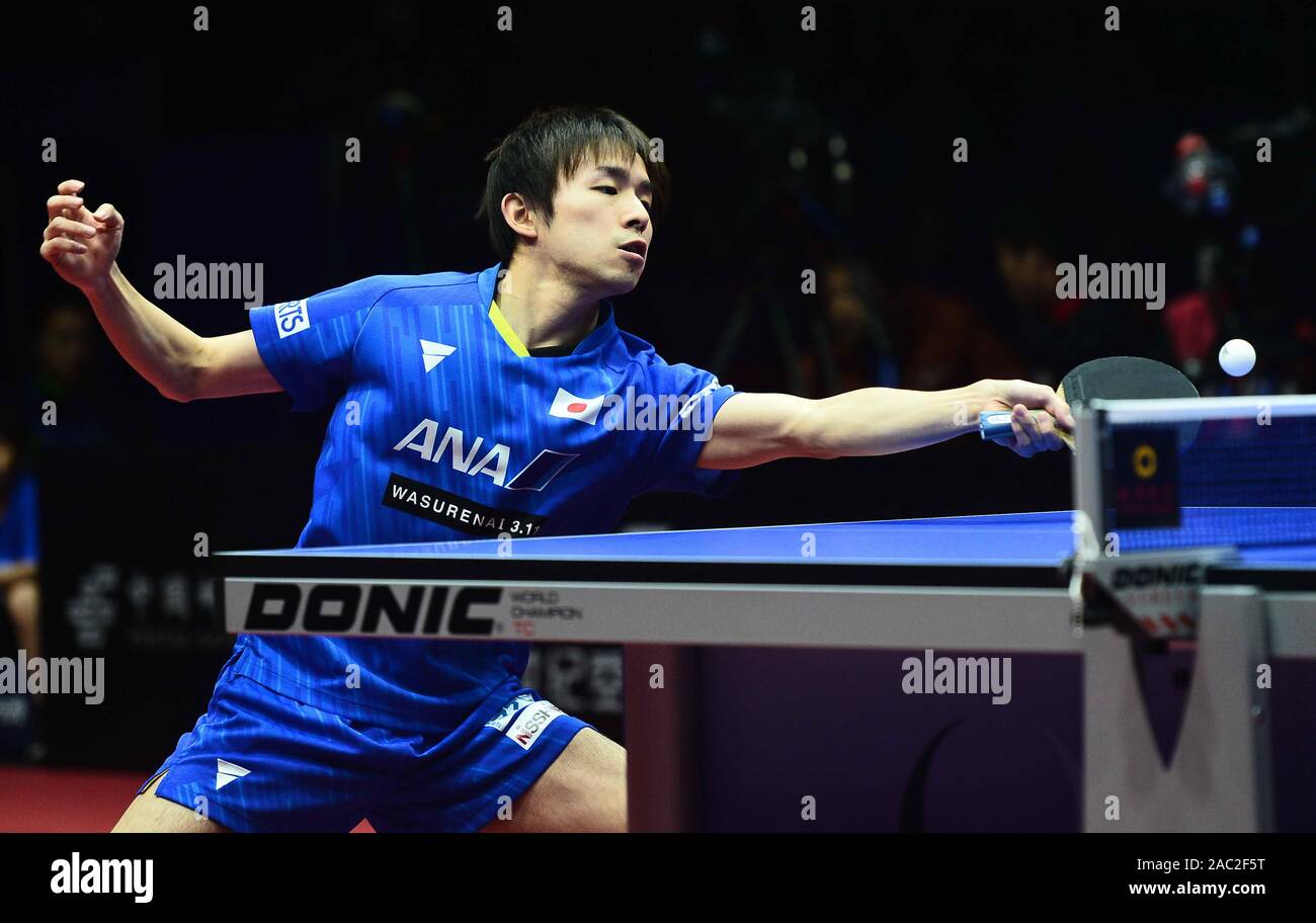 Koki Niwa of Japan in action against Tomokazu Harimoto of Japan in their Men's Singles Quarterfinals match during the 2019 ITTF Men's World Cup in Che Stock Photo