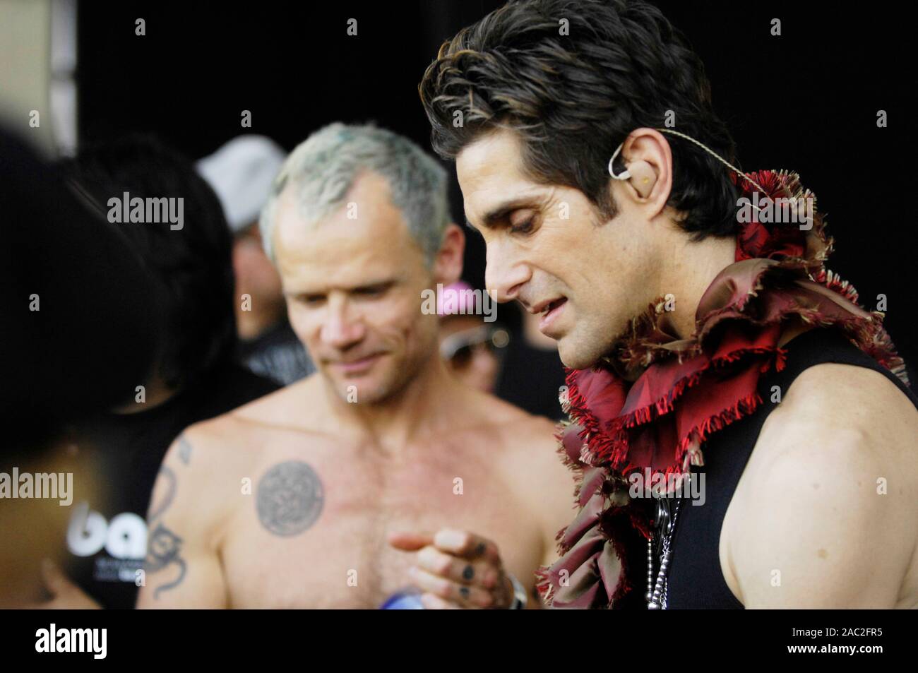 (L-R) Flea and Perry Farrell backstage at the 2009 Coachella Music Festival in Indio. Stock Photo