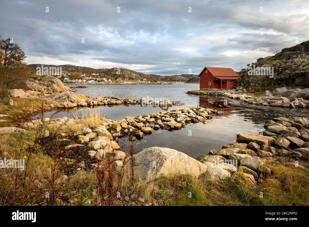 Spangereid, Norway, October 2019: Boat house by the fjord Stock Photo