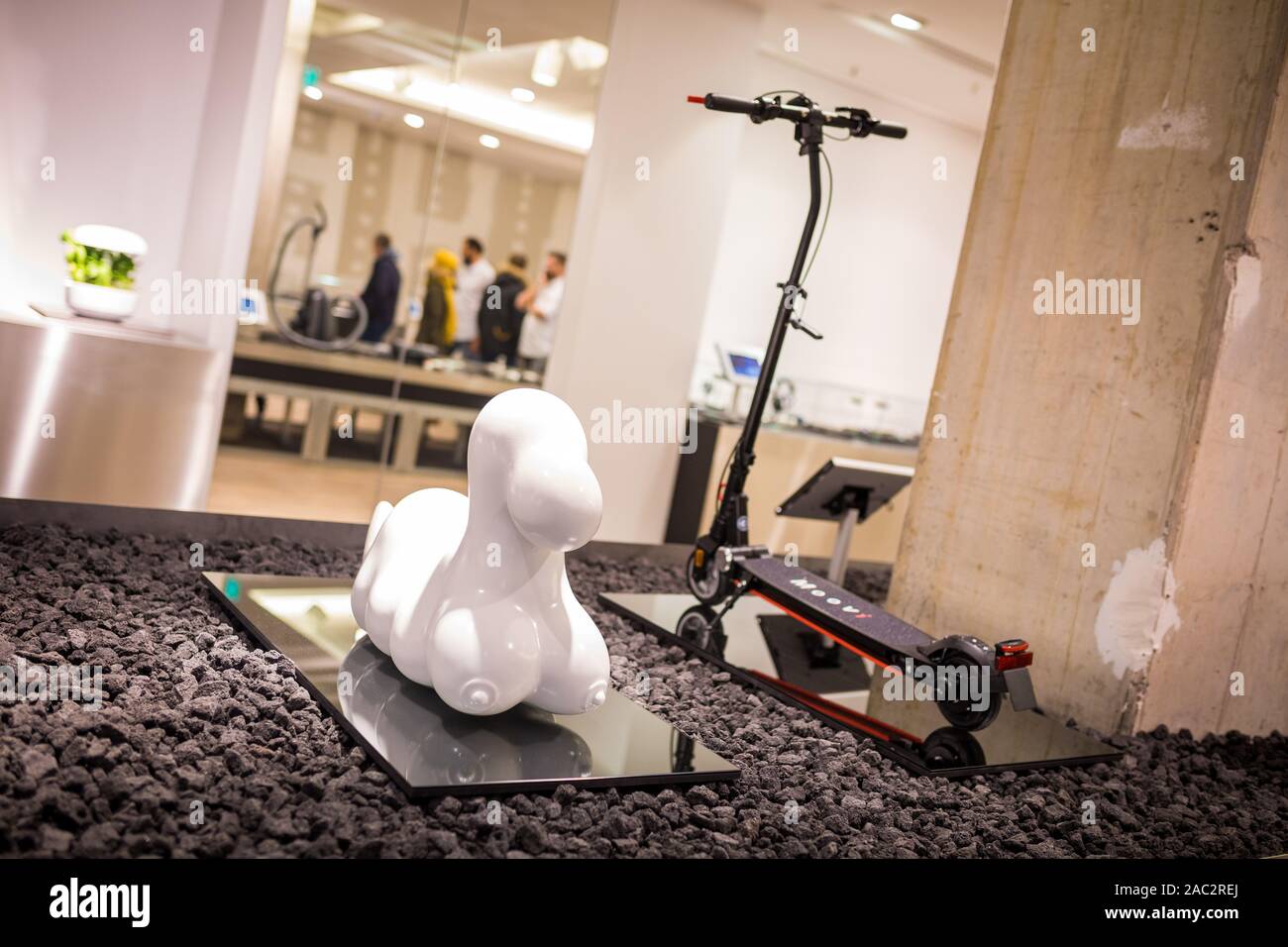 Hanover, Germany. 30th Nov, 2019. An art object and an e-scooter are presented in new multi-brand store Vaund. The in the shop will be on advice - customers can try