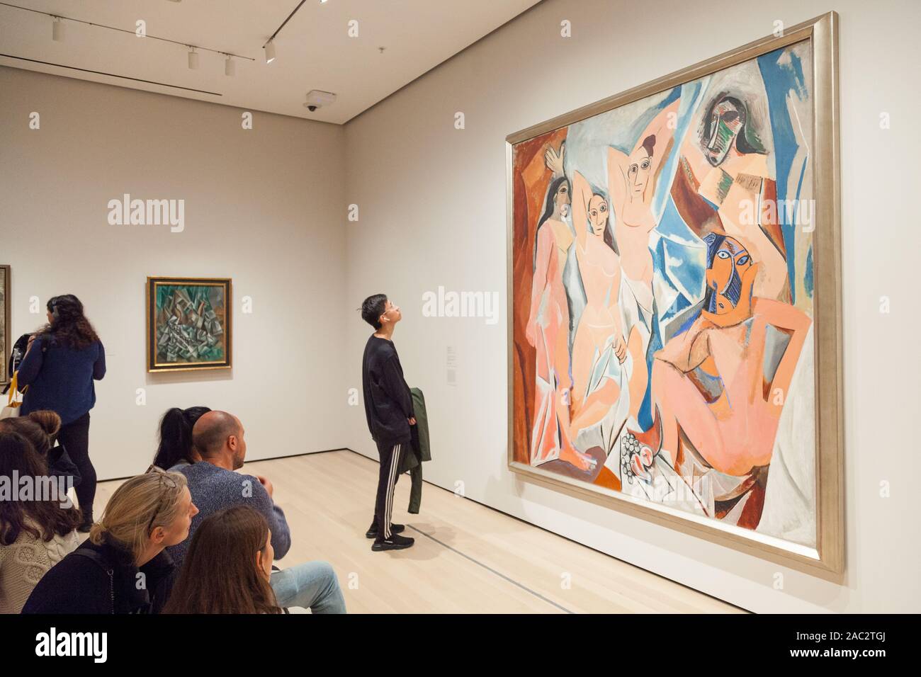 Pablo Picasso Painting Les Demoiselles D Avignon At The Museum Of pablo-picasso-painting-les-demoiselles-d-avignon-at-the-museum-of