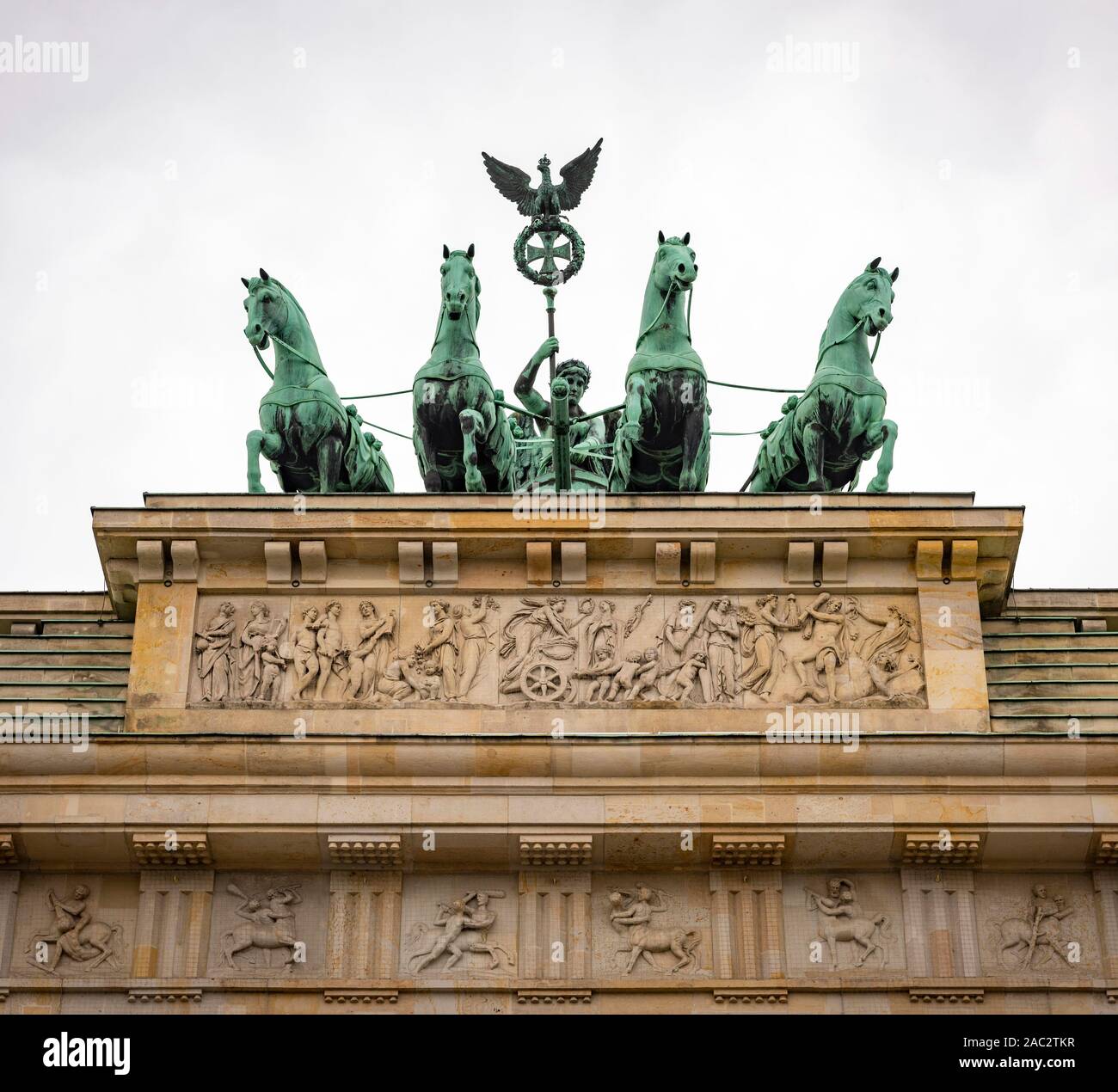 The Quadriga and standard bearing Goddess on The Brandenburg Gate, Berlin, Germany Stock Photo